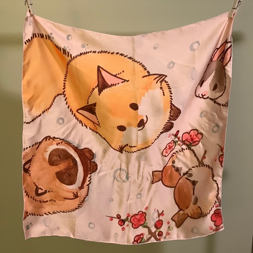 Cute pink animal scarf.